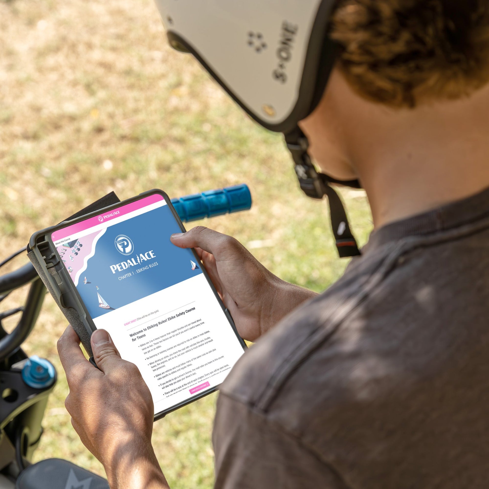 Student taking an online course on an iPad